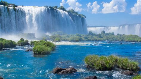 Iguazú Falls or Iguaçu Falls waterfalls of the Iguazu River between Argentina and Brazil ...