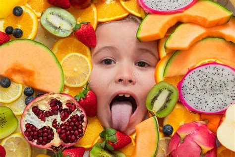 Funny Licking Fruit. Top View of Funny Kids Face with Different Fruits. Summer Fruits Stock ...