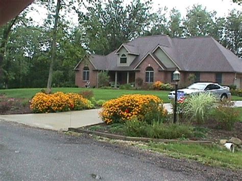 planting at driveway entrance | Driveway entrance landscaping, Driveway ...