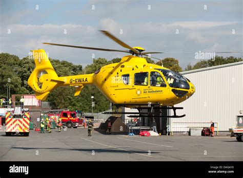 Helimed Helicopter Paramedic Landing Firefighters Stock Photo - Alamy