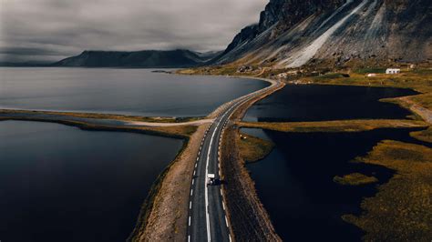 Download Road With Mountain In Iceland Desktop Wallpaper | Wallpapers.com