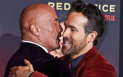 The Rock Makes Hilarious Guess About What Ryan Reynolds Spends His Money On