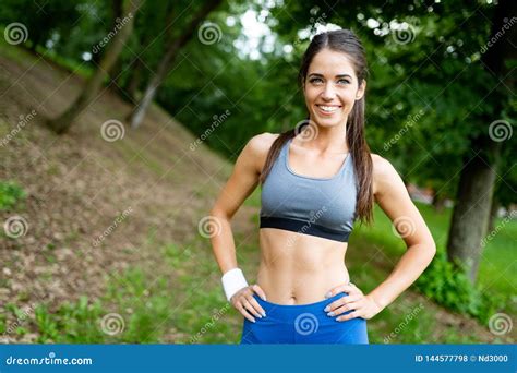 Happy Young Woman Doing Excercise Outdoor in a Park, Jogging Stock Photo - Image of health ...