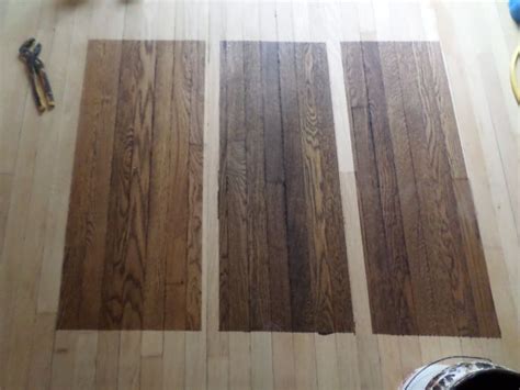 Original 1925 White Oak floors, stains starting from left: Minwax- Special Walnut, Dark Wal ...