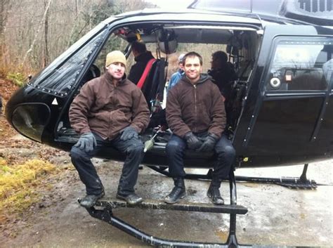 Stuntmen Byron Brisco & Lars Grant sit in Garza's helicopter on the set ...