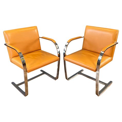 Two Gordon International Flat Bar Brno Armchairs in Orange Leather, circa 1970s For Sale at 1stDibs
