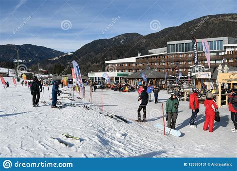 Skiers in Front of Hotel on Ski Piste in Kranjska Gora, Slovenia Editorial Photo - Image of male ...