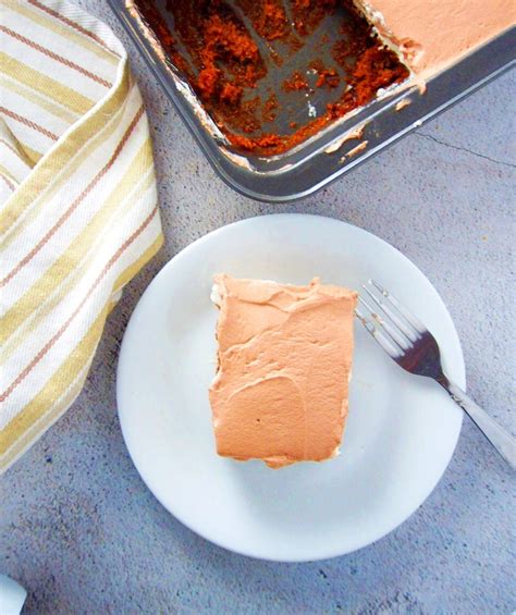 Ovaltine Cake with Whipped Cream Ovaltine and Vanilla Icing | Woman Scribbles