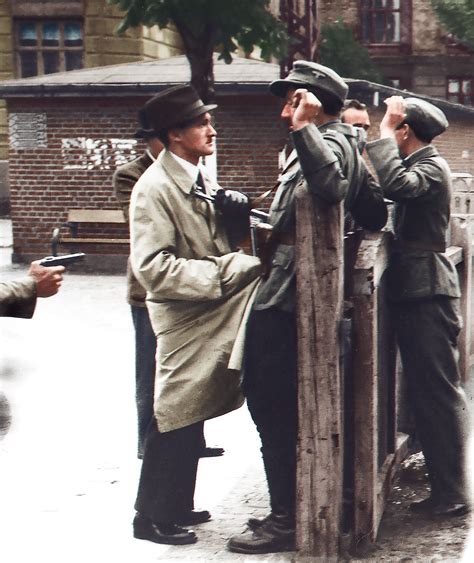 Danish resistance fighters hold up and disarm two German soldiers ...