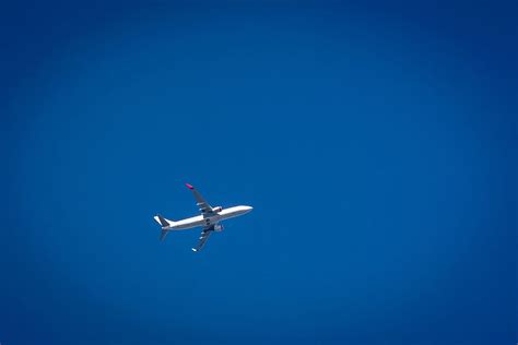 Plane in clear blue sky Free Photo Download | FreeImages