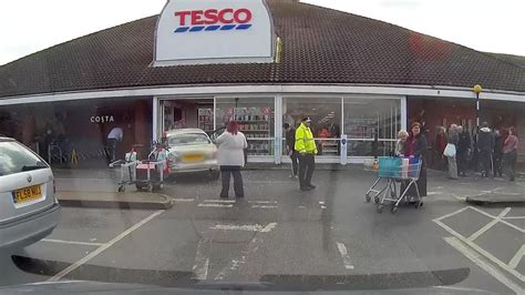 Tesco Sidcup car crash caught on camera as pensioner smashes Jaguar into supermarket in front of ...