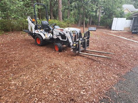 Compact Tractor with Forks and Backhoe Loader - Savannah's Equipment ...