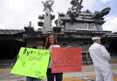 Carrier George Washington heads home from Japan