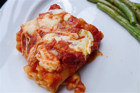 Dimples & Delights: Baked Manicotti with Meat Sauce