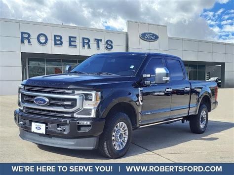 Pre-Owned 2020 Ford F-250 Platinum 4 Door Crew Cab Truck in Orange #8814A | Roberts Ford