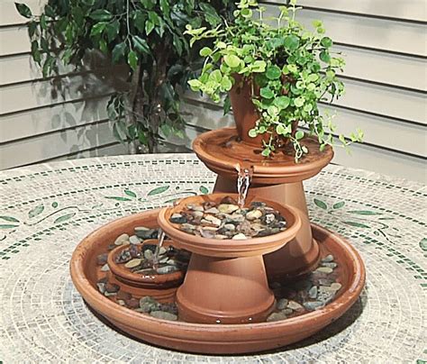 28 Budget-Friendly And Fun Clay Pot Projects Diy Water Fountain, Diy Garden Fountains, Indoor ...