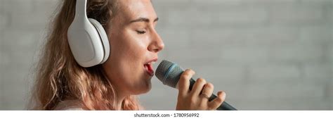 Teeth Holding Microphone: Over 413 Royalty-Free Licensable Stock Photos | Shutterstock