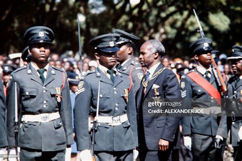 Zimbabwean president Canaan Banana reviews troops during a military... News Photo - Getty Images