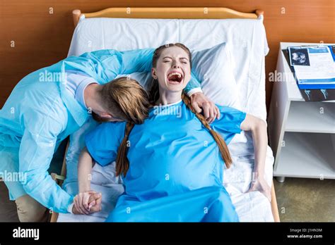 Woman giving birth hi-res stock photography and images - Alamy