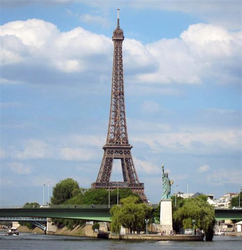 Eiffel Tower and little Statue of Liberty along Seine, Paris