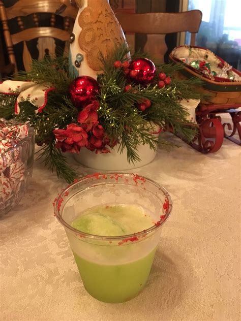 Grinch punch: One 2 liter bottle of sprite Green/lime sherbet Red sugar to rim the glass Perfect ...