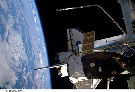 ESA - View from the ISS showing Space Shuttle Discovery and a Soyuz spacecraft docked