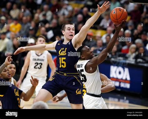 Colorado guard McKinley Wright IV, right, drives past California ...