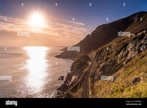 Sunrise with sun star on a Cliff Walk between Bray and Greystones Stock ...