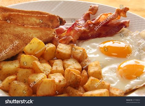 Breakfast Eggs Bacon Toast Hash Browns Stock Photo (Edit Now) 47738833