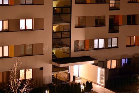 Exterior of Apartment Building at Night Stock Photo - Image of blind, facade: 141477348