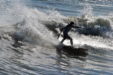 Surfing Jax Beach Pier Jacksonville Florida USA