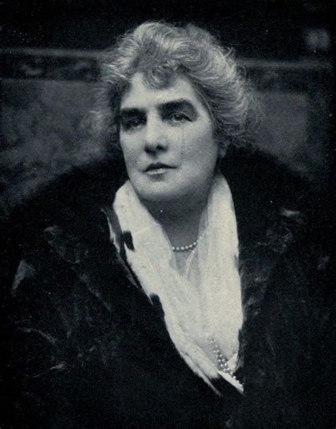 an old black and white photo of a woman