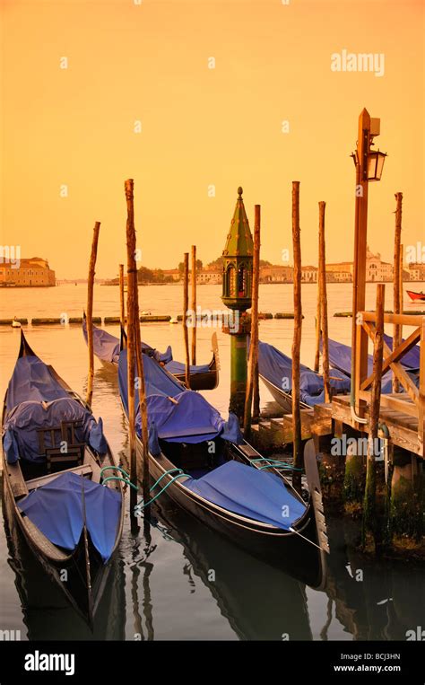 Venice gondolas at sunrise Stock Photo - Alamy