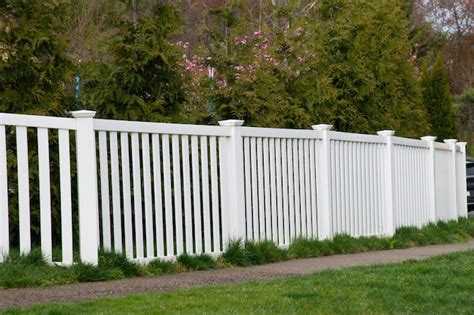 Premium Photo | White plastic fence around the house