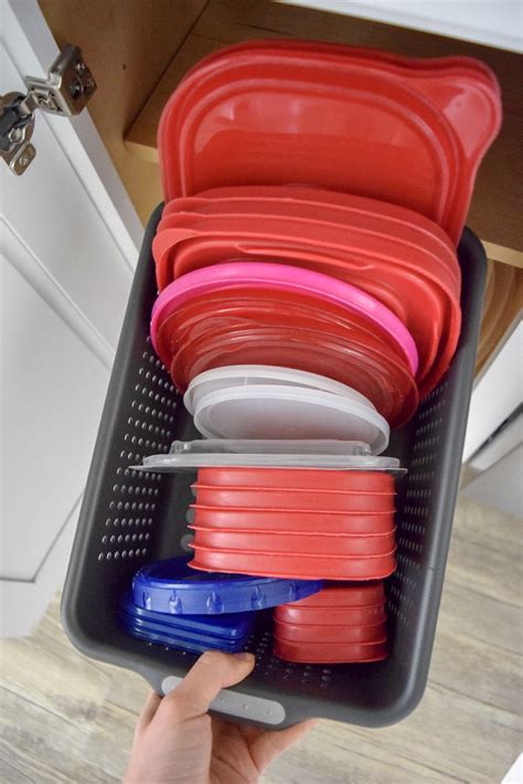 Tupperware Lid storage | Tupperware organizing, Tupperware, Cupboards organization