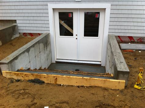 Net Zero Energy Cape Cod: Exterior Facade & Stair | Basement doors, Basement stairs, Basement ...