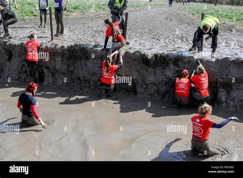 Girls running mud hi-res stock photography and images - Alamy