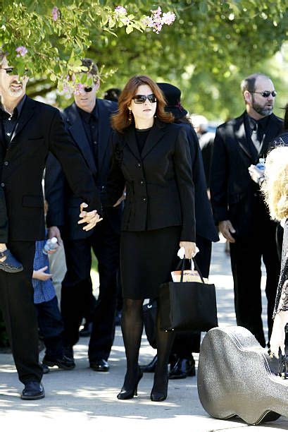 Rosanne Cash attends the funeral for her father country music legend ...