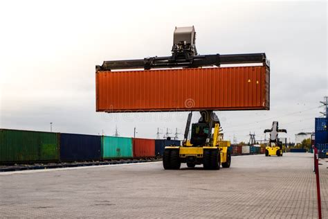 Forklift Handling Cargo Container. Freight Container Loading Stock Photo - Image of truck ...