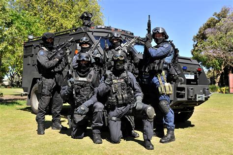 Western Australian Police's TRG Squad pose for a photo before the WA Police Expo [2048x1362] | Squad