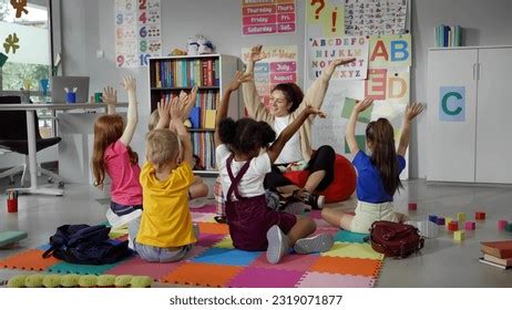 Elementary School Teacher Sit Class On Stock Photo 2319071877 | Shutterstock