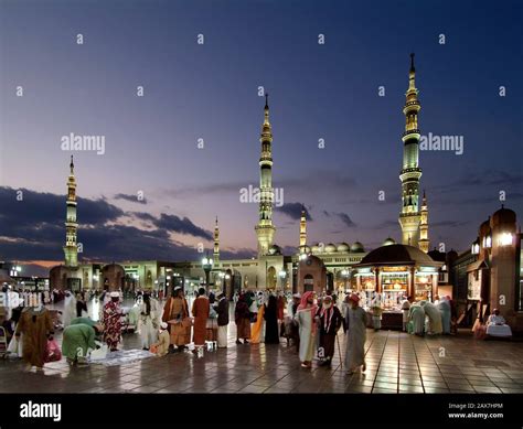 Worshipers in front of the Grand Mosque of Al Madinah Al Munawwarah, Saudi Arabia Stock Photo ...