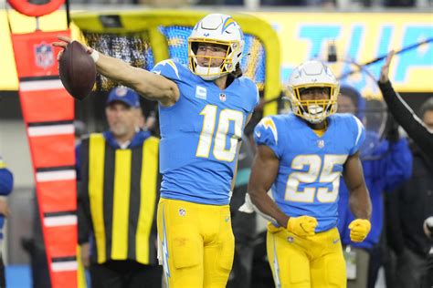 Chargers look to carry momentum from win into stretch run | AP News