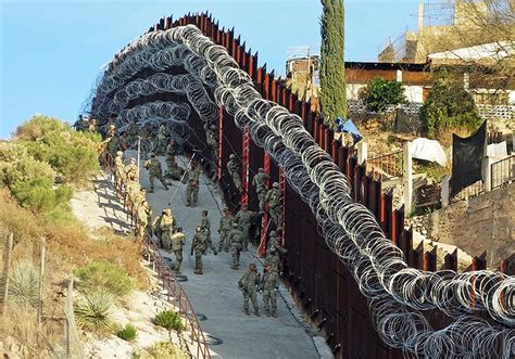 Arizona city officials want troop-installed razor wire removed from border wall