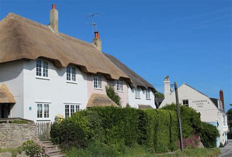 Thatched cottages and Lulworth Cove Inn, Lulworth Cove - Beautiful England Photos