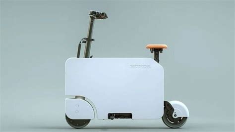 Scooter in a suitcase? Honda unveils Motocompacto EV that is foldable ...