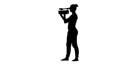 Silhouette Of Cameraman Walking With Camera And Shooting A Film (backward Movement). Full HD ...