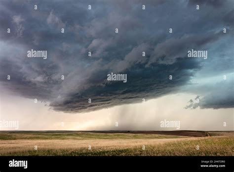 Stormy weather and sky with dark clouds and rain falling near Glendive, Montana, USA Stock Photo ...