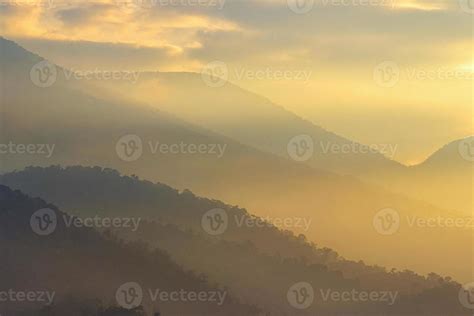 morning view on the mountain range in yellow 7978000 Stock Photo at Vecteezy