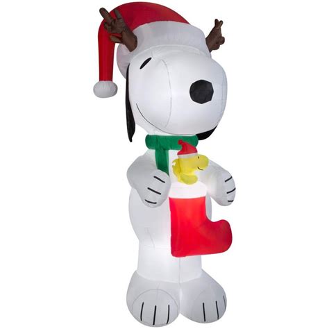 Peanuts 10.01-ft x 4.49-ft Lighted Snoopy Christmas Inflatable at Lowes.com